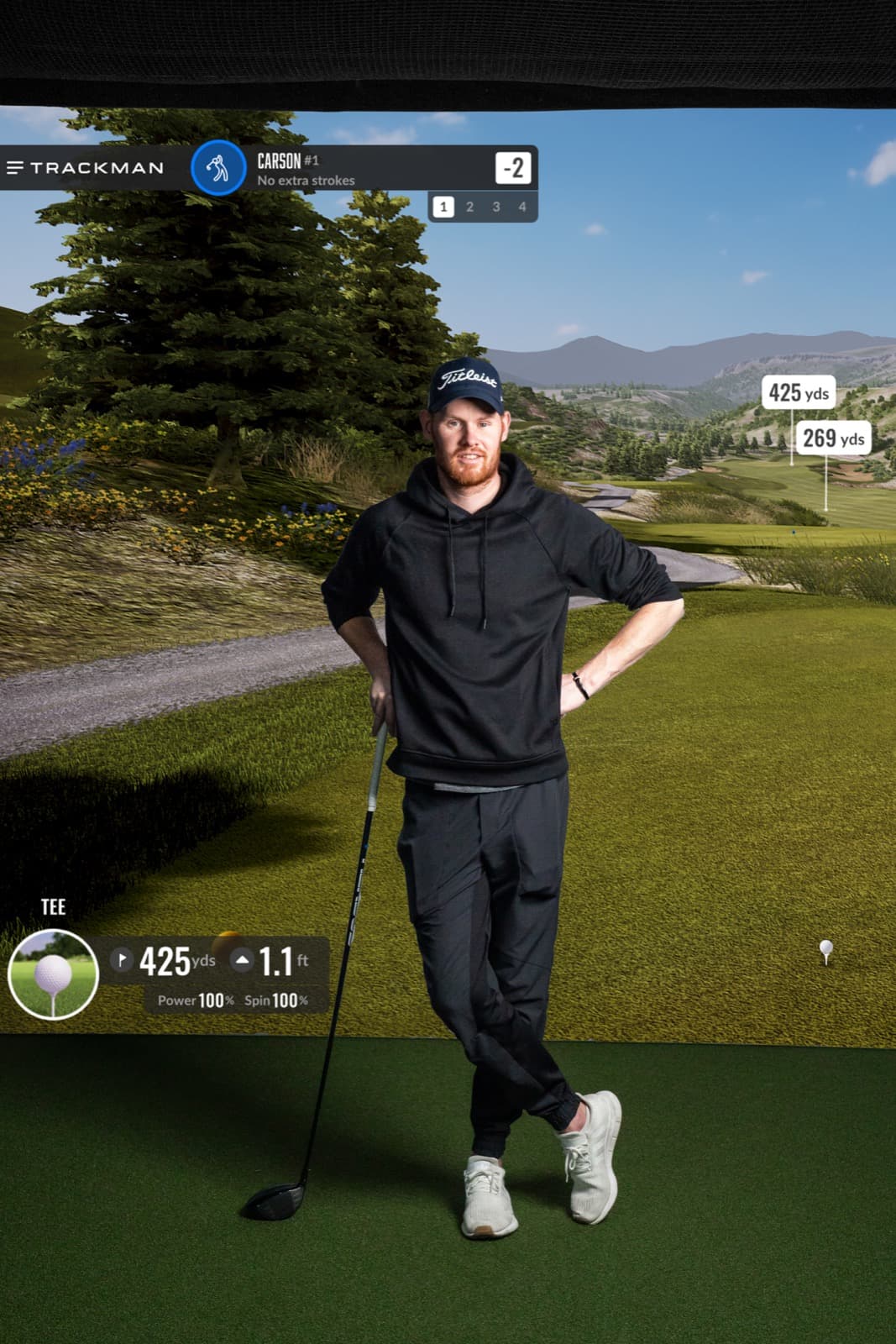 Player posing with TrackMan data